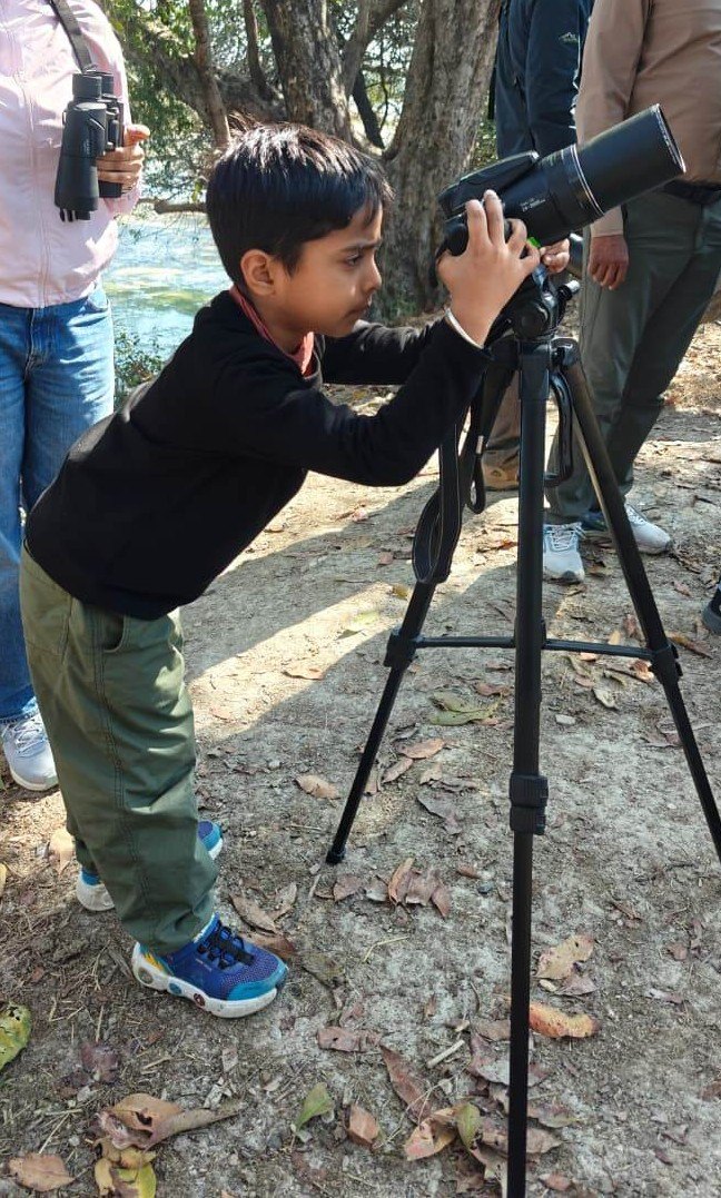 Yuvan Jha with his camera in the field