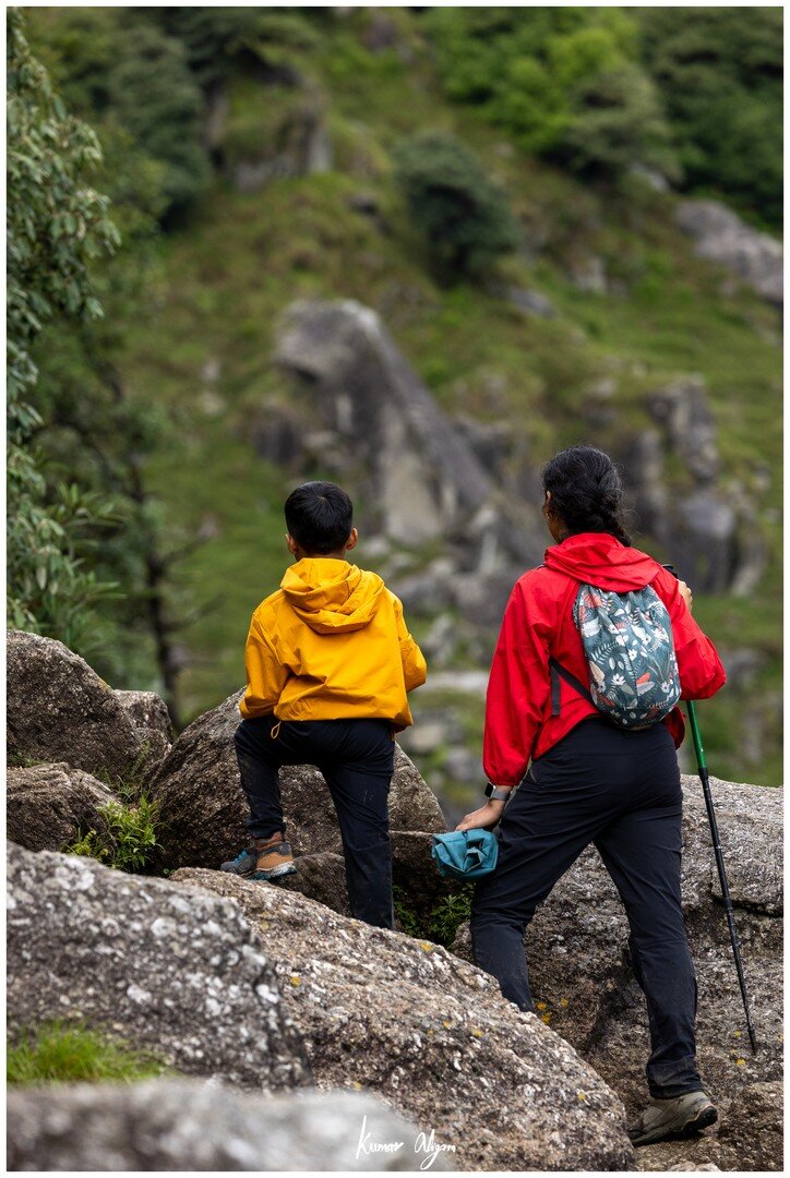 Yuvan and Ma looking out over the green valley